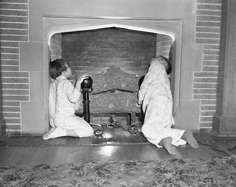 Santa slides down the chimney tonight! (1954) - History Forgotten Moments Unseen Photos