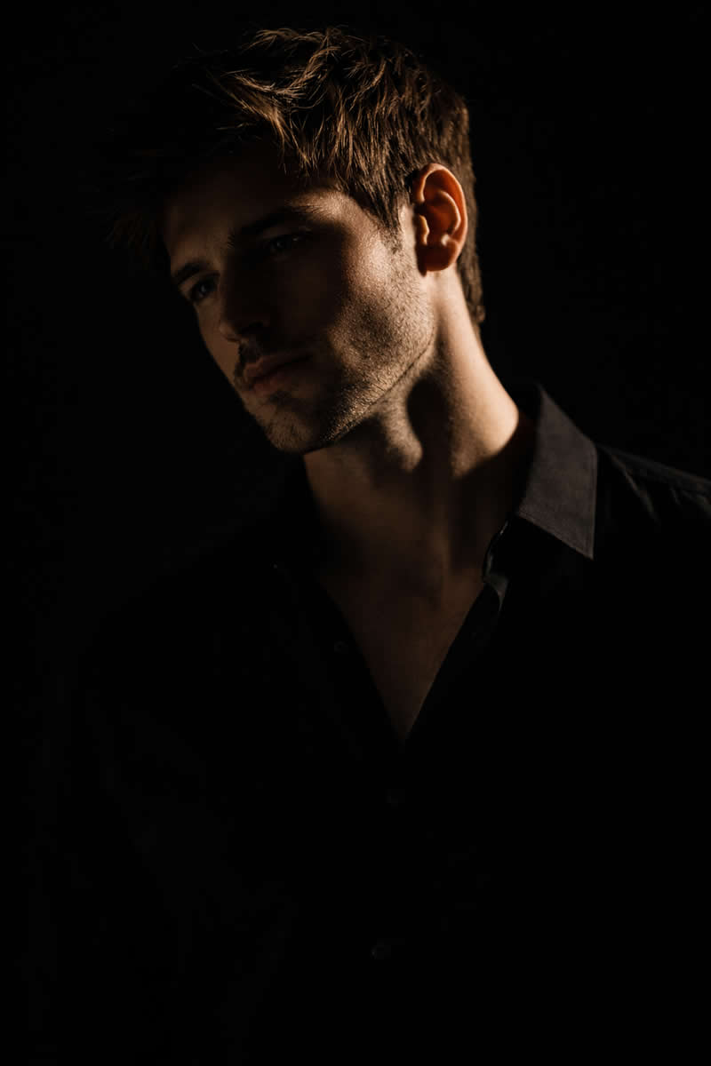 Dramatic Side Light Portrait - Must-Try ChatGPT Prompts for Modern Portrait Photography