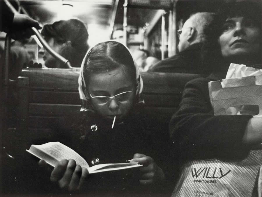 Girl reading in the Paris Metro - Abisag Tullmann Master Legendary Photographer