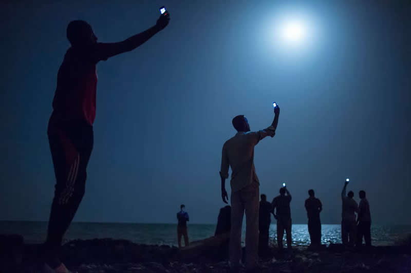 Somalis on a beach in Djibouti by John Stanmeyer - Most Iconic Photos From the National Geographic Archives