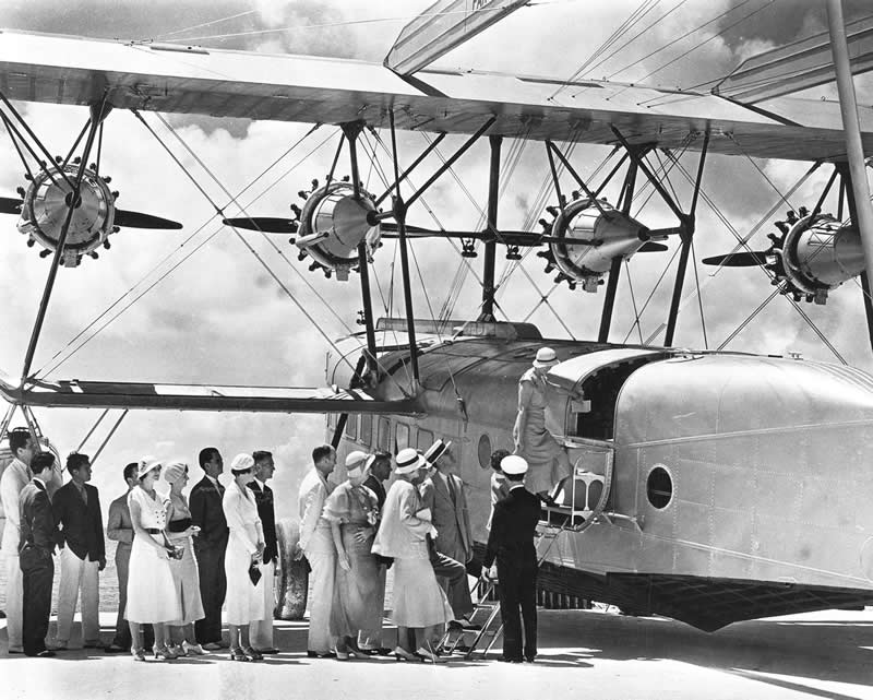 Passengers board a new upgraded Pan American Sikorsky S-40 plane. 1932 - Old Photos That Capture Rare and Forgotten Moments in History