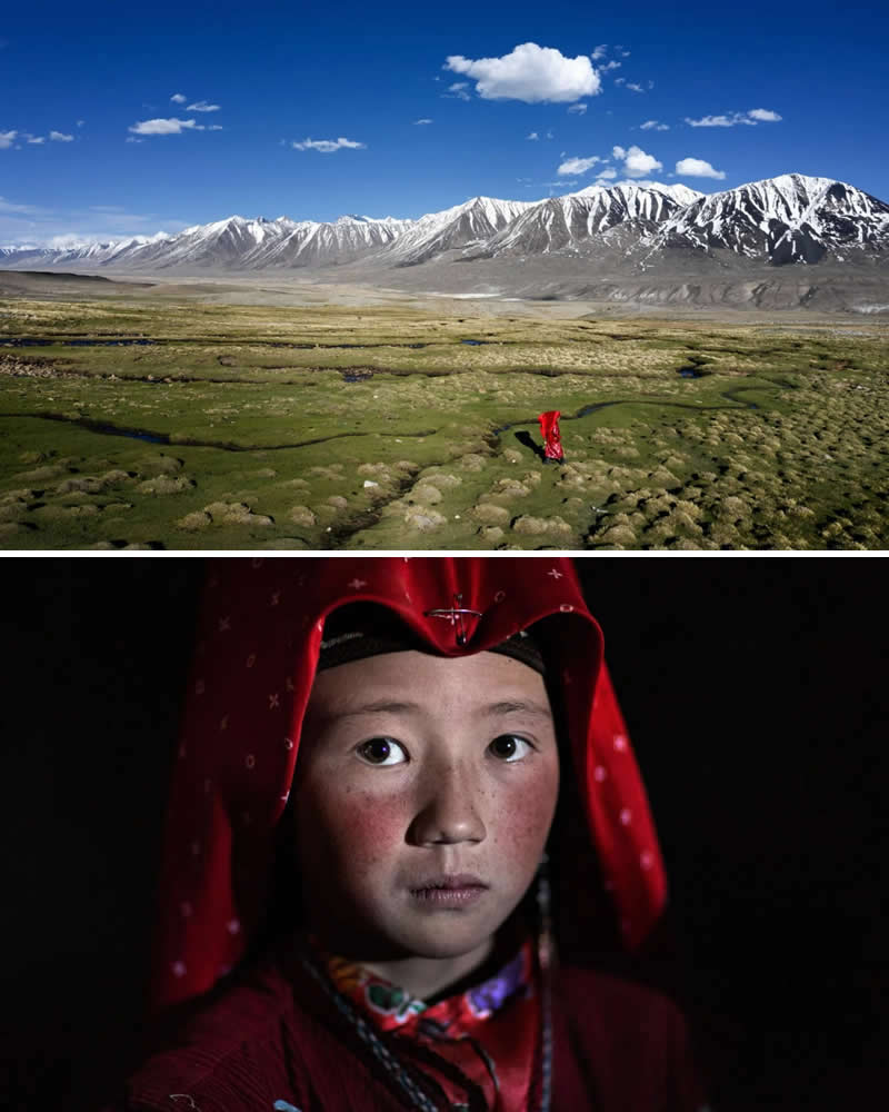 Alessandro Bergamini’s Portraits That Connect People to Their Landscapes 38 Portrait of a young Kyrgyz girl wearing traditional red clothing paired with a wide mountain valley landscape in the Pamir Mountains of Kyrgyzstan, showing a solitary figure walking across green plains beneath dramatic snow-capped peaks, highlighting the bond between culture and high-altitude terrain.