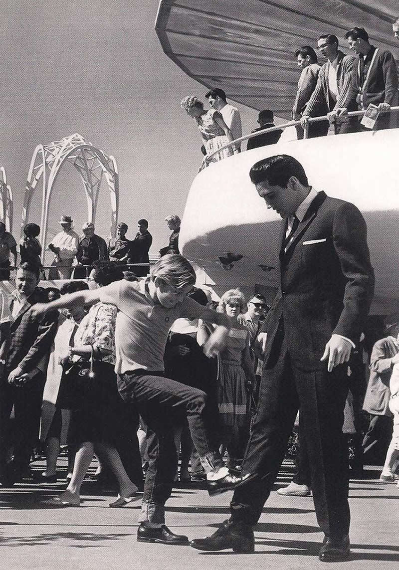 33 Unseen Photographs That Reframe American History 41 Young Kurt Russell kicking Elvis Presley in the shin, 1963.