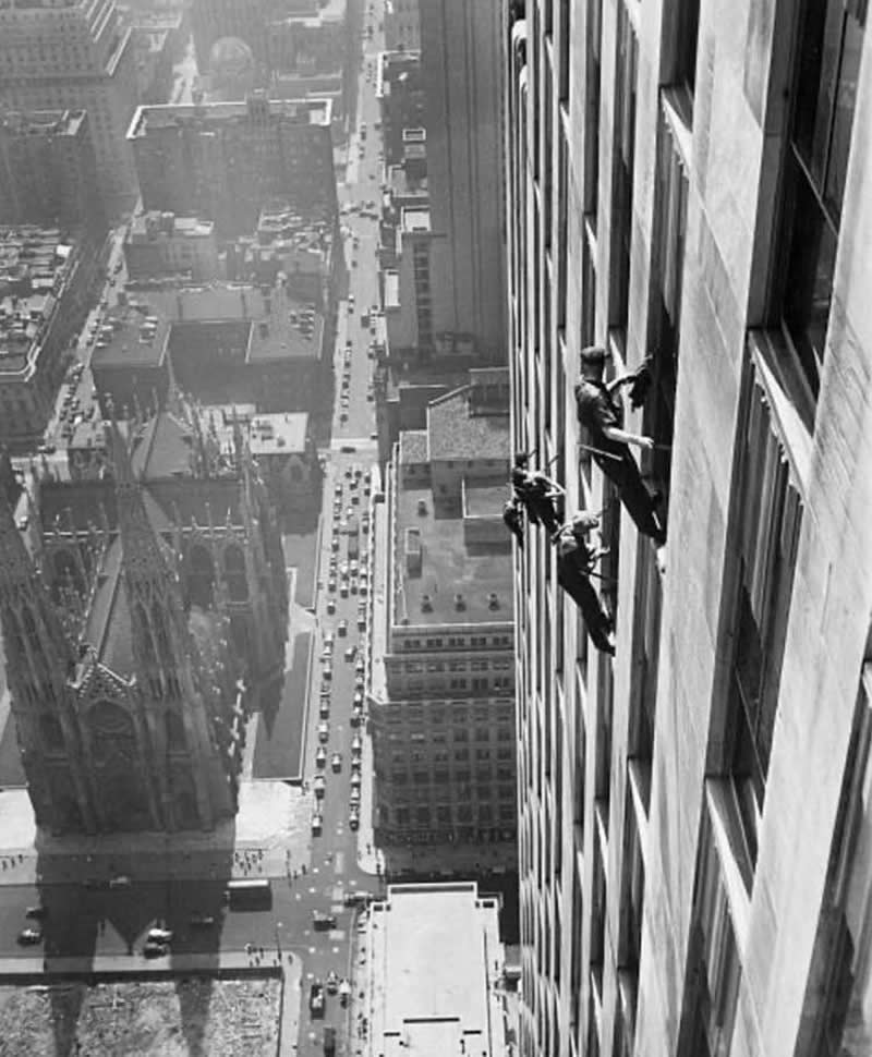 33 Unseen Photographs That Reframe American History 55 Window cleaners at work on a skyscraper in New York City, 1936.
