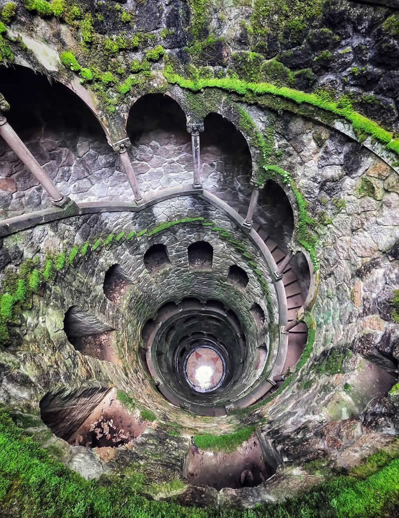 The Initiation Well at Quinta da Regaleira highlights Portugal&rsquo;s historical ties to the enigmatic Knights Templar. This 88-foot-deep structure lies within the grounds.