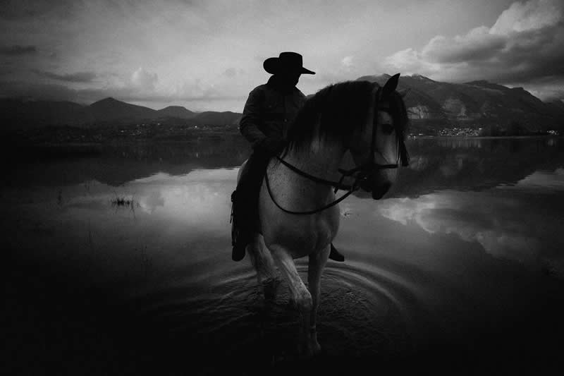 Finalist: "Horse and Rider" by Matteo Lava - Life Frame Black and White Photo Contest Winners