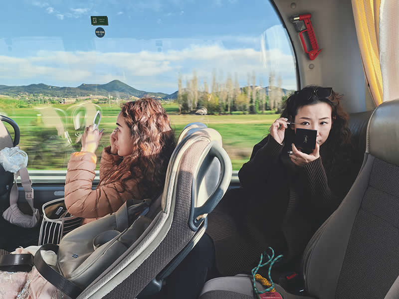 Makeup in Bus by Guanhong Chen - Mobile Photography Awards Travel Winners