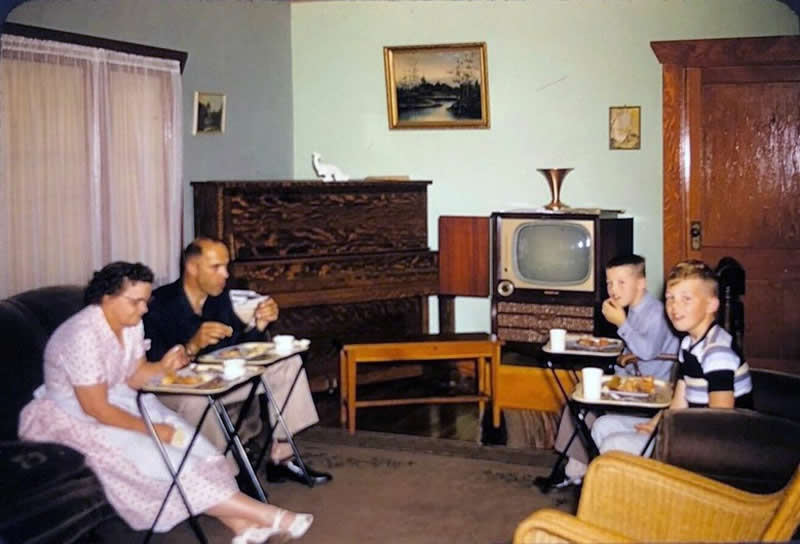 Dinner on trays around the TV (1960s)