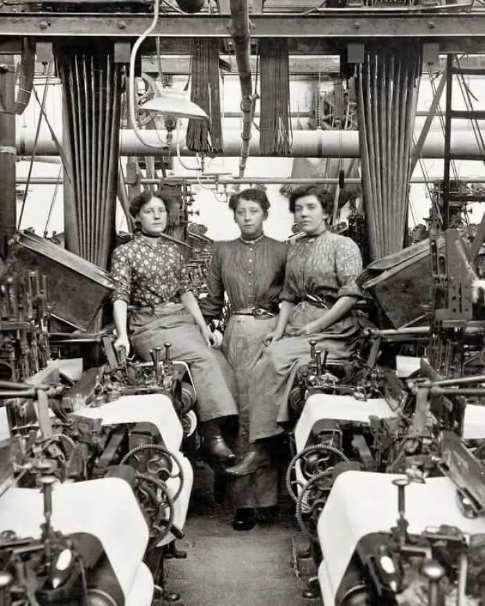 Women factory workers in a cotton mill in Lancashire, circa 1908