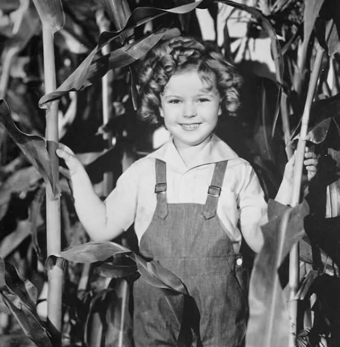 Shirley Temple publicity shot taken during filming of Curly Top, 1935.