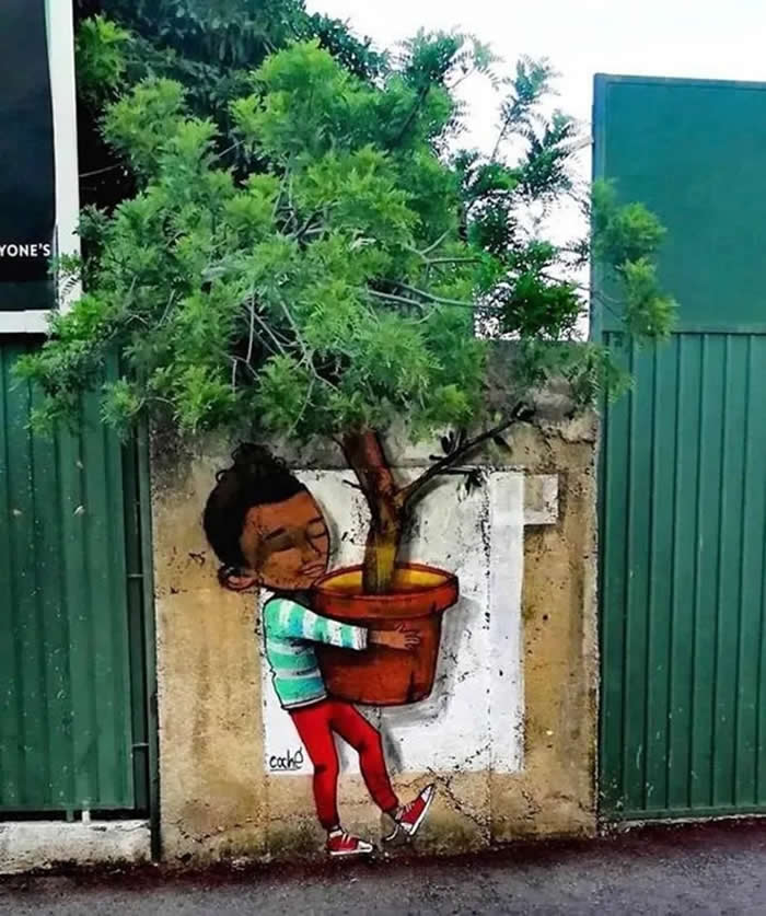 Hugging the Tree - Street Art Photos Merge with Nature