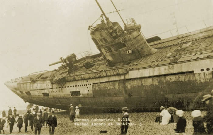 U-118, a World War I submarine washed ashore on the beach at Hastings, England 1919.