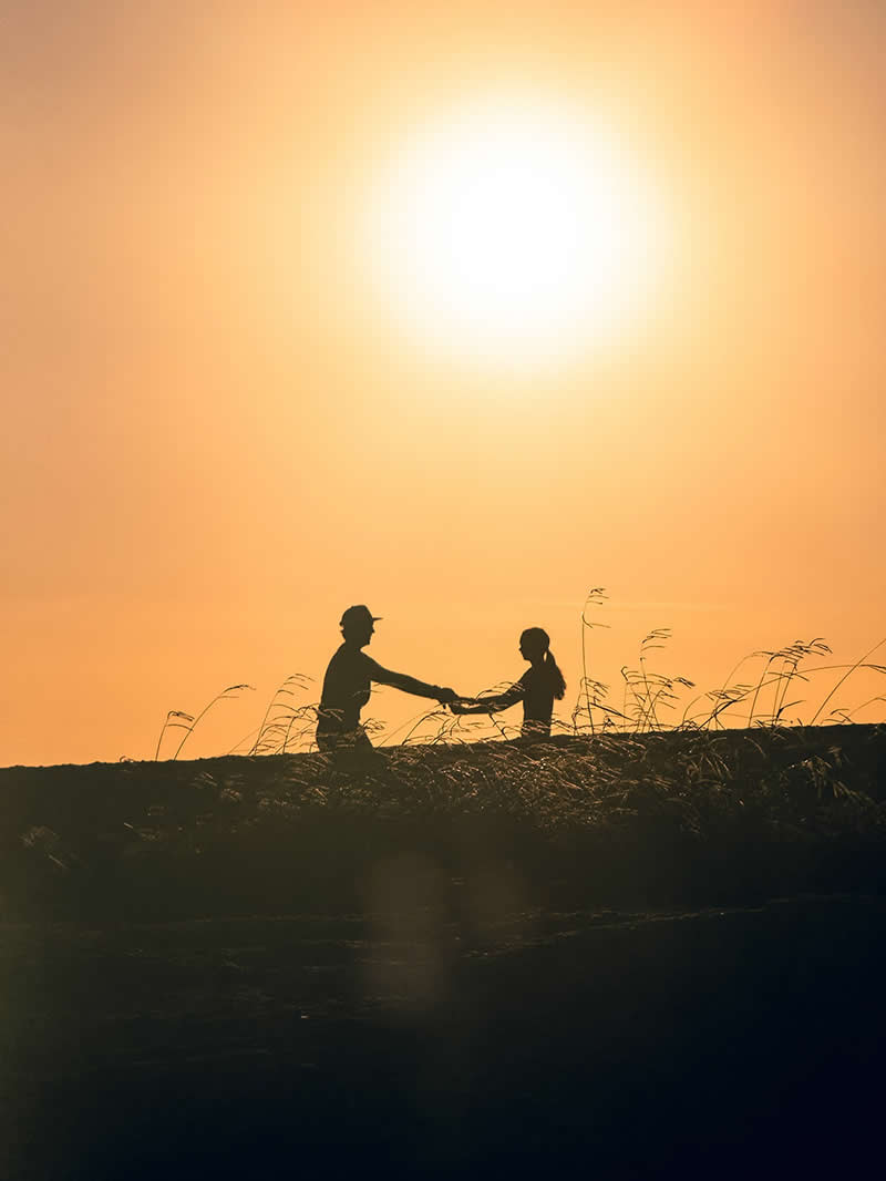 Shot on Phones: 33 Amazing Silhouette Photos That Redefine Mobile Photography 46 Mountaintop Dancing at Sunset by Maurice Bakley - Mobile Photography Awards Silhouettes Winners