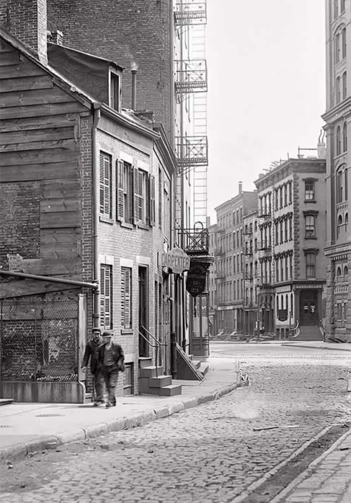 New York, circa 1890. Street view, 21-23 Pearl Street.