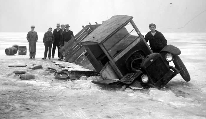 Rum-runners attempting to drive alcohol exported from Canada over the frozen Detroit River, ca. 1920s.