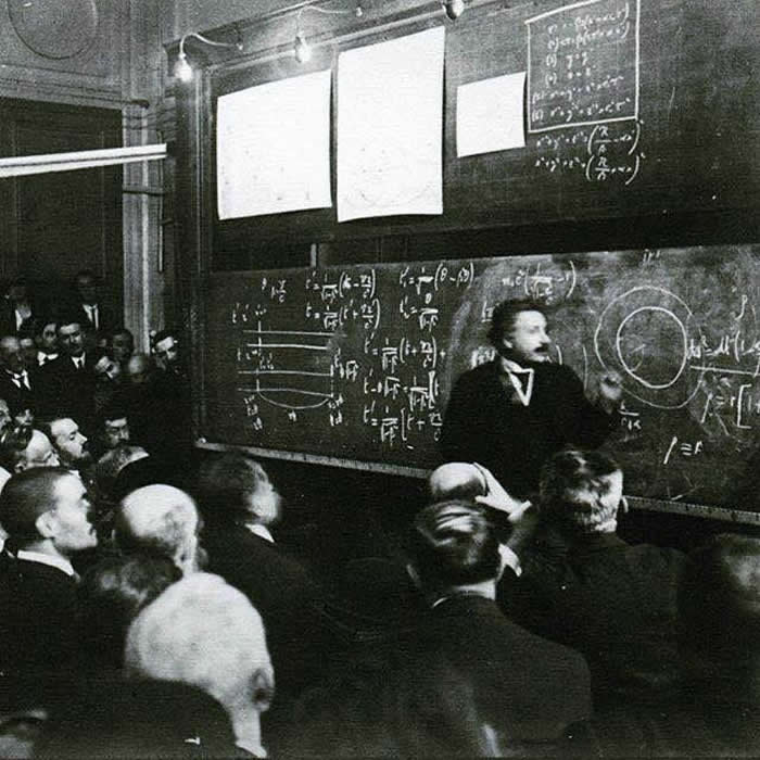 Actual photo of Albert Einstein lecturing on the Theory of Relativity, 1922. Guy in front is getting headache.
