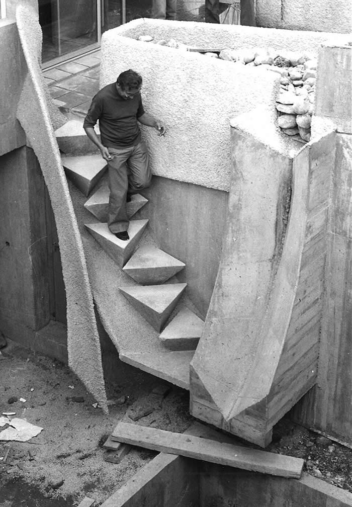 Architect Pierre Debeaux descending the geometric stairs of Villa Pradier. Built in Lavaur, France, the house was designed by Debeaux between 1974 and 1978 and later became one of the landmark works associated with his career.