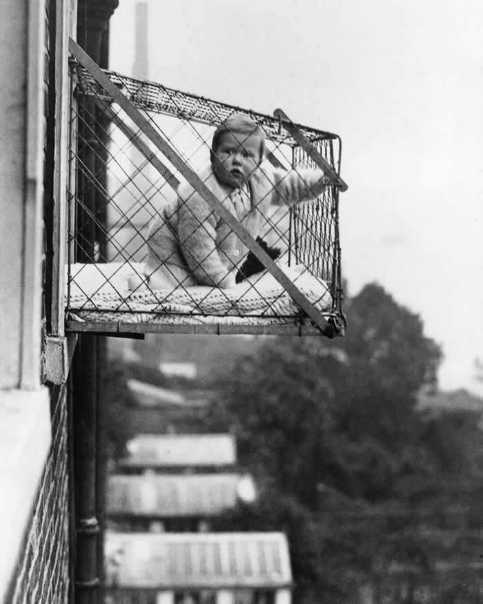 A baby cage was a bed in a wire cage suspended from city apartment windows. The "health cage", as it was initially called, was invented by Mrs. Robert C Lafferty to provide babies with fresh air and sunshine while living in crowded cities.