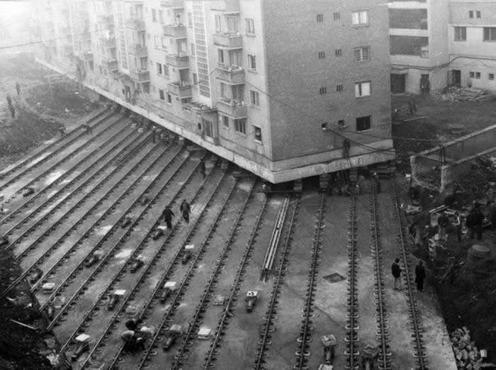 Moving a 7600 ton apartment building to create a boulevard in Alba Iulia, Romania, 1987