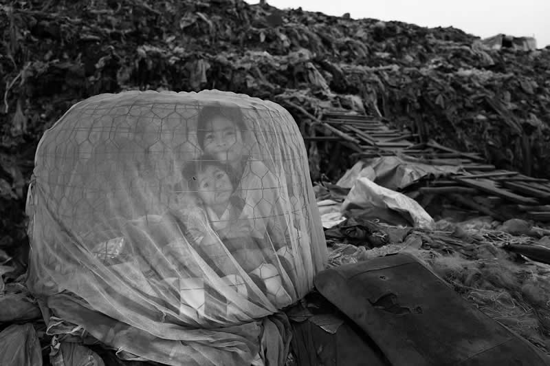 2nd Place: Dignity and Identity: Waste Pickers of Phnom Penh by Stef Gruber, Switzerland - Artist Gallery Awards Black and White Winners