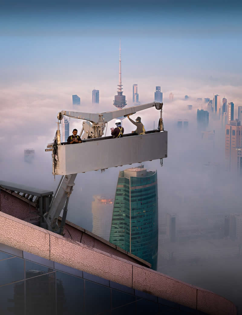 Photojournalism - Silver Winner: Above the City at Work by Saleh Alshamali - 1839 Awards Color Photography Contest 2026 Winners