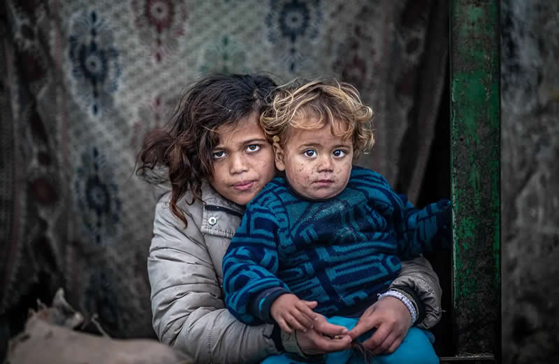 Holding On to Each Other by Abdelrahman Alkahlout, Palestine - AAP Magazine 2026 Portrait Awards Winners