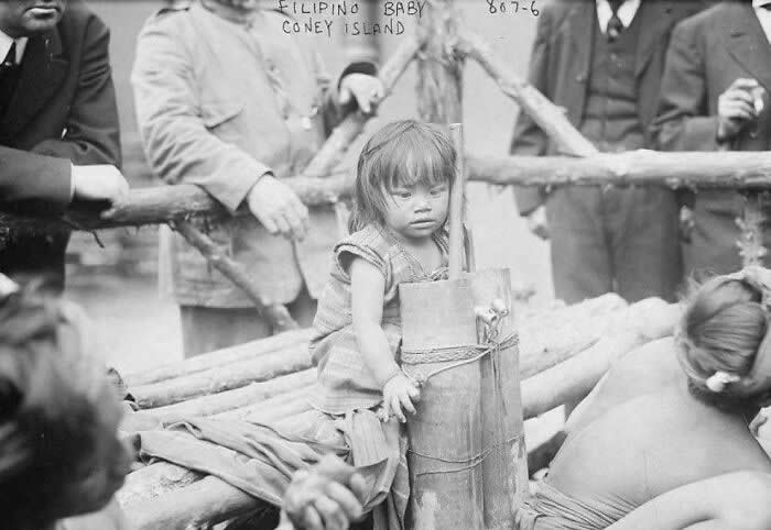 The Story Behind America: 35 Historical Photos Worth a Closer Look 48 This Is A Human Zoo In Coney Island, New York, 1905. White Americans Bought Tickets To See A Filipino Girl Tied To A Pole And Had Peanuts Thrown At Her