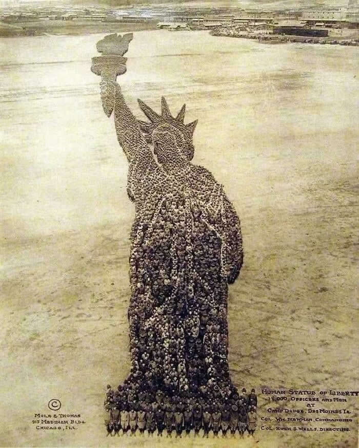 The Story Behind America: 35 Historical Photos Worth a Closer Look 56 The Shape Of The Statue Of Liberty Formed By 18,000 Soldiers Standing In Formation At Camp Dodge, Des Moines, Iowa, 1918. (Photo By Mole And Thomas, Chicago, Illinois)