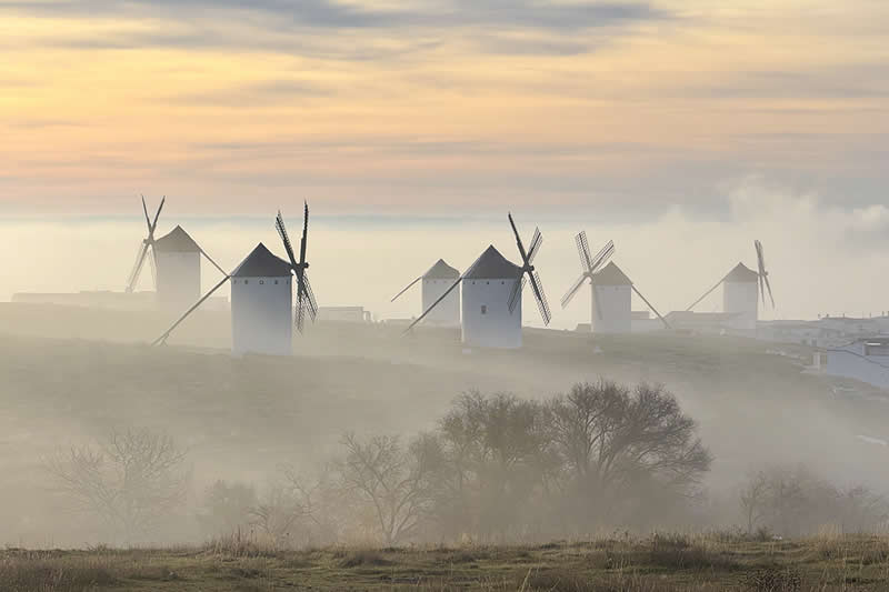 Windmills in the fog by Jesus Manzaneque Arteaga, Spain - Chromatic Awards Street and Travel Winners