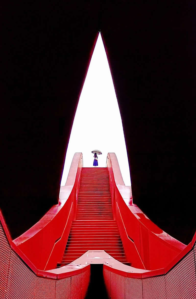 Taken with a Smartphone: 34 Jaw-Dropping Architectural Photos from the Mobile Photography Awards 65 The Solitary Figure on the Red Stairs by Gary Lee - Mobile Photography Awards