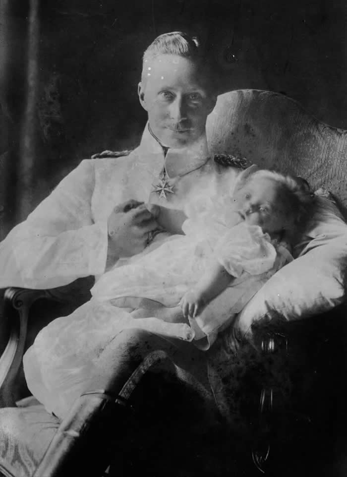 Crown Prince Wilhelm of Germany (1882-1951) and his daughter Princess Alexandrine. Princess Alexandrine was born with Down syndrome. (1916)