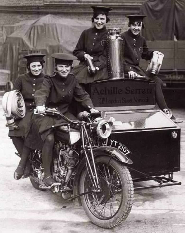 A female firefighting team on a converted motorcycle in London, 1932.