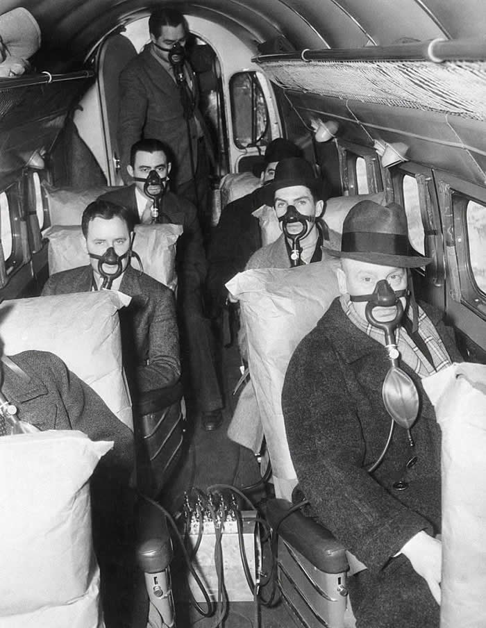 Before commercial airplanes were pressurized, passengers needed oxygen masks at high altitudes. This 1939 photo was taken during a stratosphere flight test at 20,000 feet.