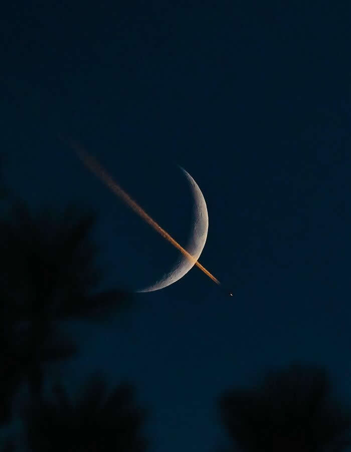 Visual Therapy: 33 Satisfying Photos Celebrating Perfect Symmetry and Balance 46 A Plane Transiting A Waxing Crescent Moon At Sunset