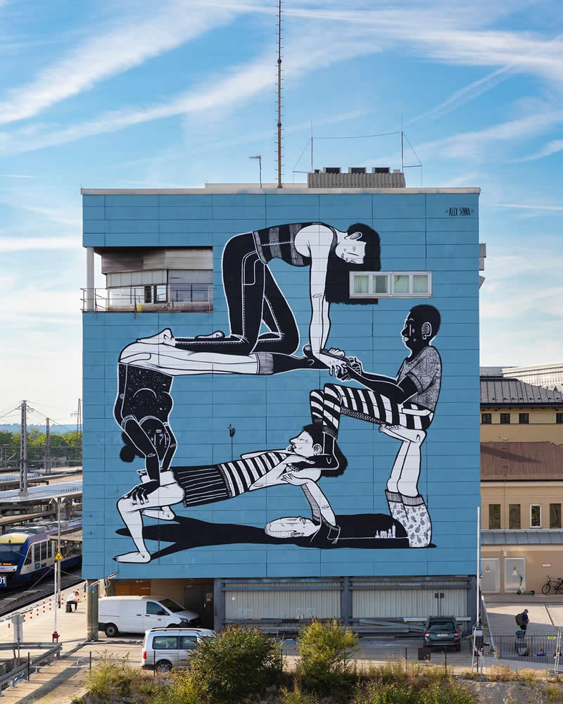 Acrobats - The Festival of Peace in the city of Augsburg, Denmark a place full of culture and history - Thought-Provoking Murals by Alex Senna