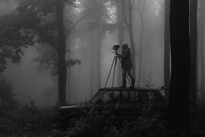 Monochrome Magic: 24 Winning Black and White Photos From the Academy Photo Awards 2026 40 Fading Away (Self-Portrait in a Foggy Wood) by Michał Korta, Poland - Academy Photo Awards 2026 Black and White Winners
