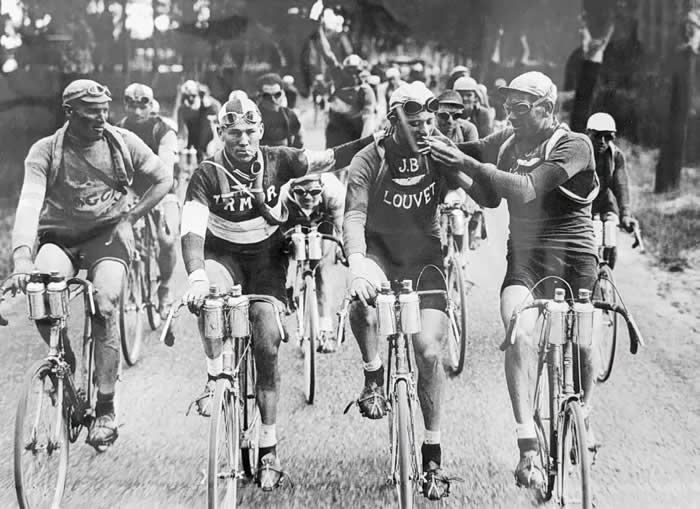 Sharing a clgarette during the Tour de France, ca. 1927
