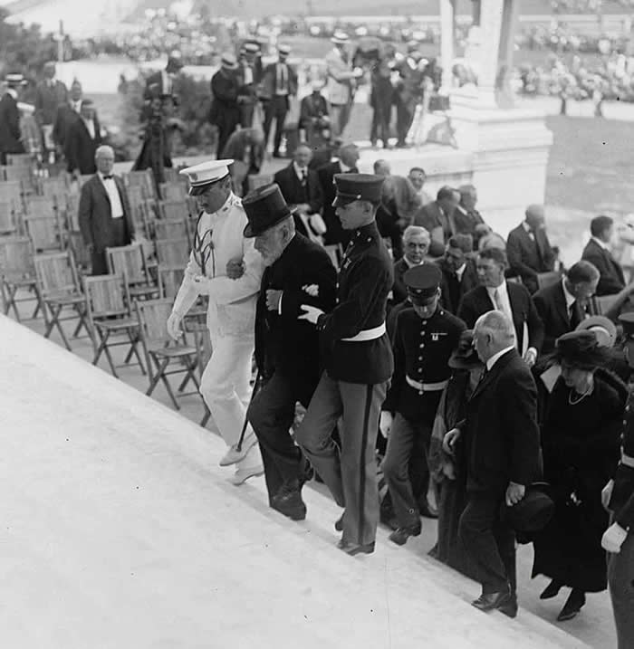 78-year-old Robert T. Lincoln (son of Abraham Lincoln) is helped up the steps at the dedication of the Lincoln Memorial in Washington D.C., 1922