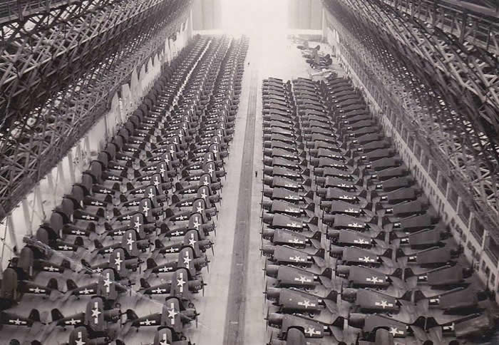 Newly built F4U Corsair and F6F Hellcats being prepared to be shipped to the Pacific theatre, USA, 1944
