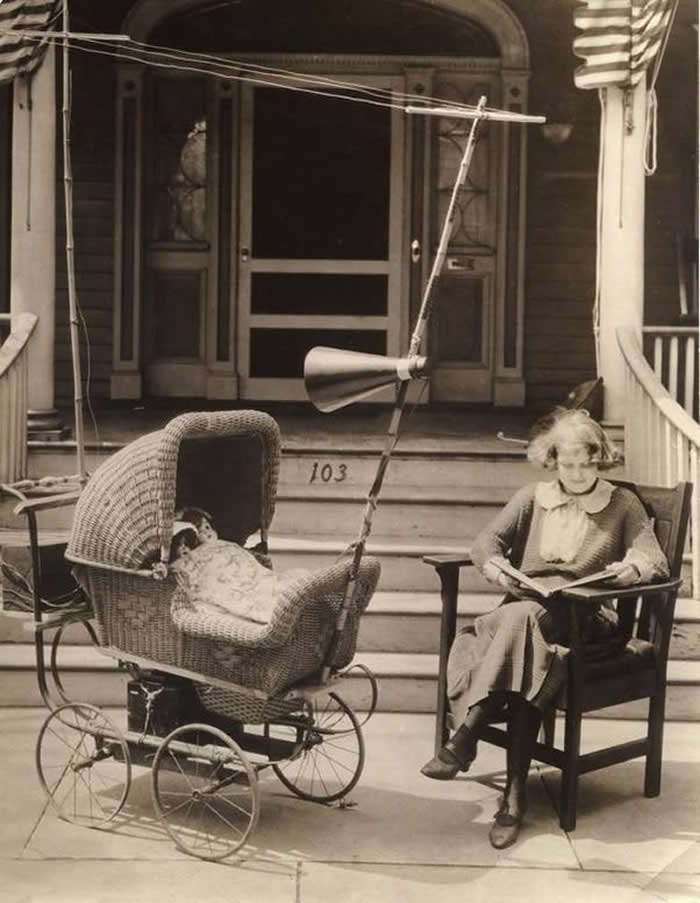 Radio pram, USA 1921. Pram provided with a radio, including antenna and loudspeaker, to keep the baby quiet.
