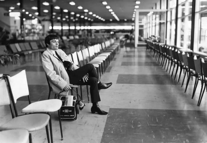 Once a Beatle: When Ringo Starr was ill with tonsillitis, Jimmie Nicol substituted him on drums for 8 concerts and lived a superstar's life for 10 days. Here pictured, Jimmie Nicol sitting alone in the Melbourne airport, waiting for the plane that'll take him back to obscurity. (15 June 1964)