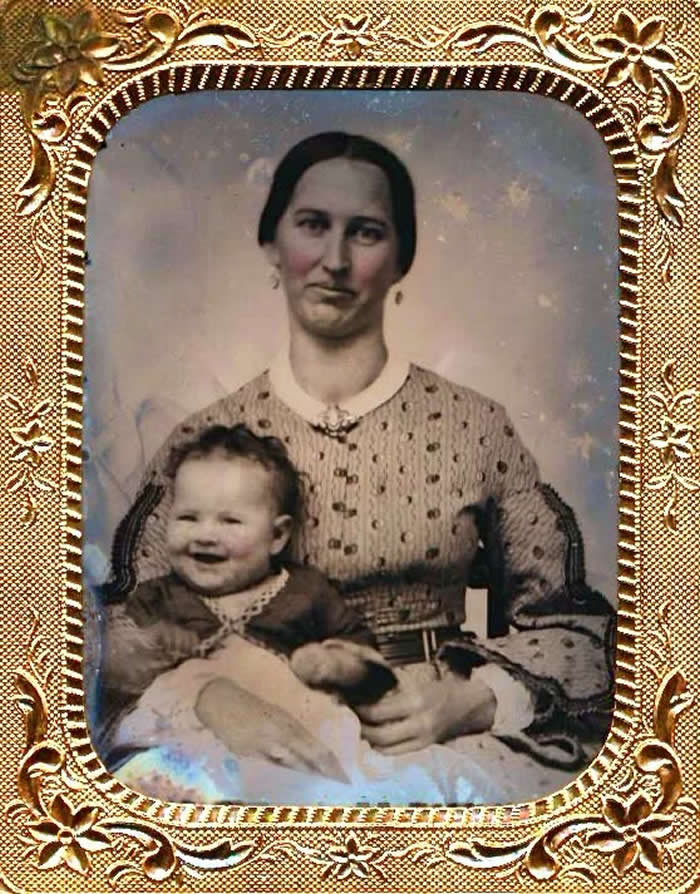 A mother tries to hold in a smile/laugh while her baby burst out laughing, Daguerreotype, circa 1850s