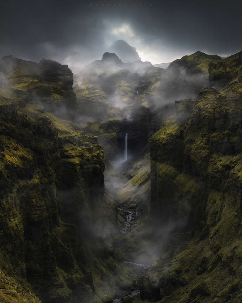 Playing with foggy mood around the lost Canyon in Iceland