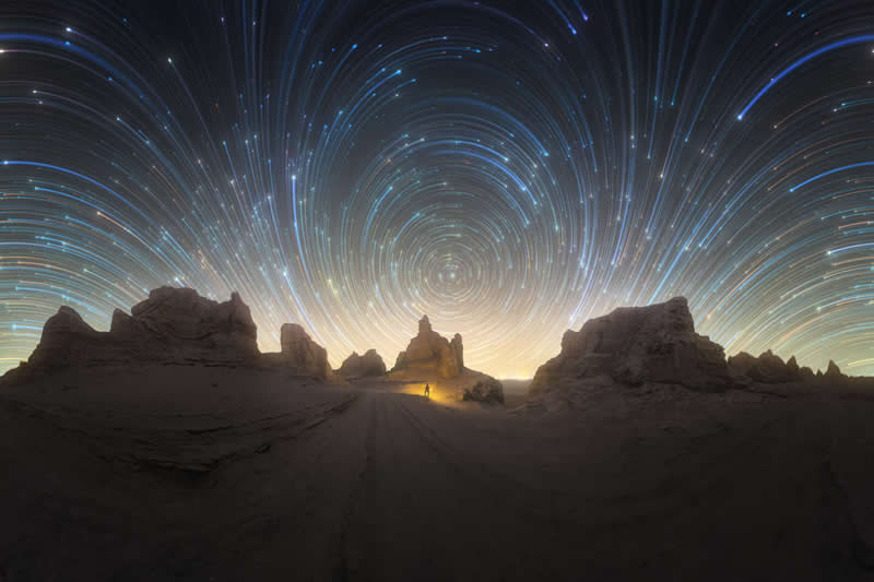 Nightscapes - Second Place: Wind-Carved Earth, Star-Written Night by Yifei Pei - 2026 Capture the Dark photography contest Winners