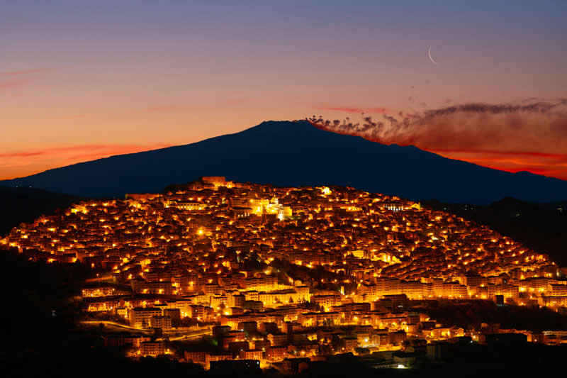 Quality Lighting and Design - Third Place: Visions from Sicily Gangi, Etna with Gas Rings, Venus and the Sickle Moon by Dario Giannobile - 2026 Capture the Dark photography contest Winners
