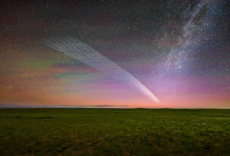 The Impact of Light Pollution - First Place: Artifical Comet by Kouyu Wang - 2026 Capture the Dark photography contest Winners