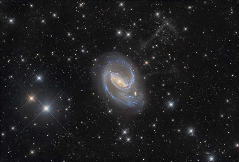 Deep Sky Observations - Second Place: Echoes of a Merger by Paul Montague - 2026 Capture the Dark photography contest Winners
