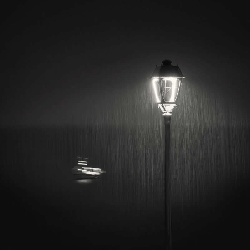 Night Photography - 2nd Place: In the Rain by Rolandas Urbonavicius - Minimalist Photography Awards 2026 Winners