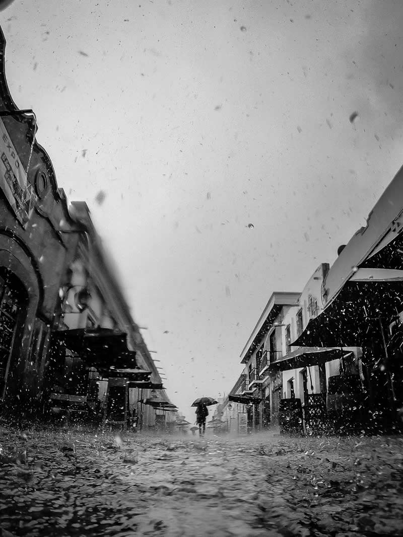 3rd Place Winner: The Rain by Sven Delaye, France - Pure Street Photography 2026 Winners