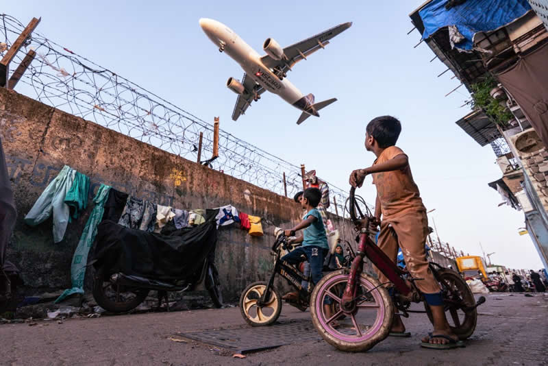 Urban Photo Awards 2026: 35 Finalist Photos That Turn Everyday Streets Into Art 68 Steel Birds And Street Dreams by Maya Mohan - Urban Photo Awards 2026 Street Finalists